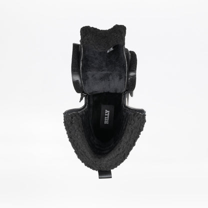 Black shoe with textured sole and visible brand logo on a white background